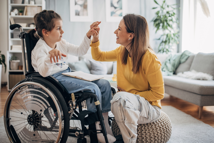 parent and daughter with special needs at home